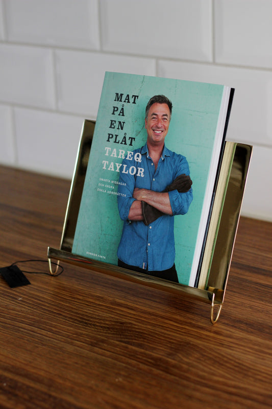 Bokställ i mässingsfärg