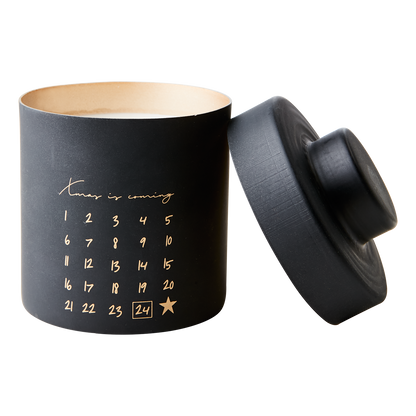 Svart doftljus med lock på sidan